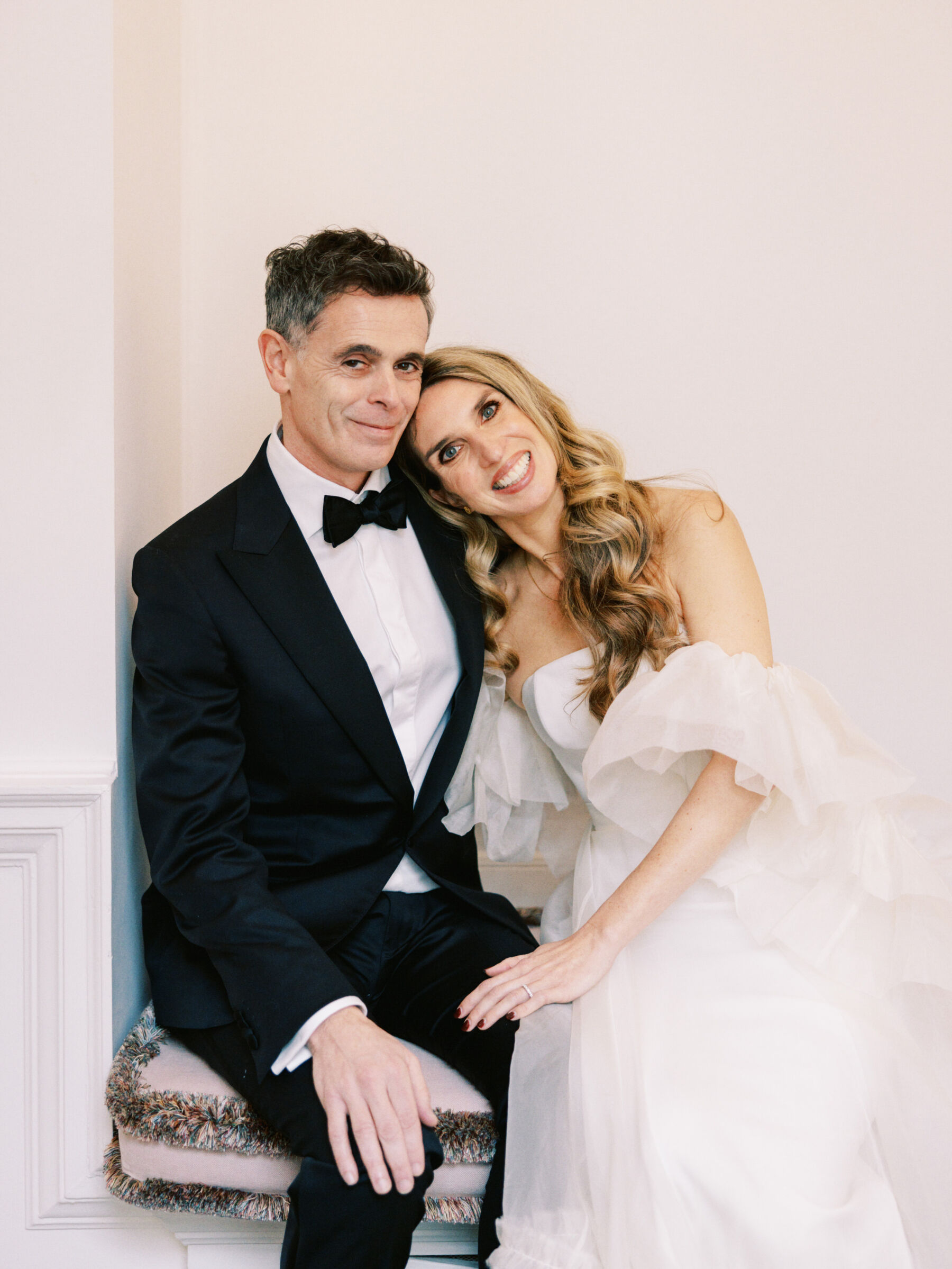 Elegant modern bride and groom in black tie, at The Ned, London. Kernwell Photography.