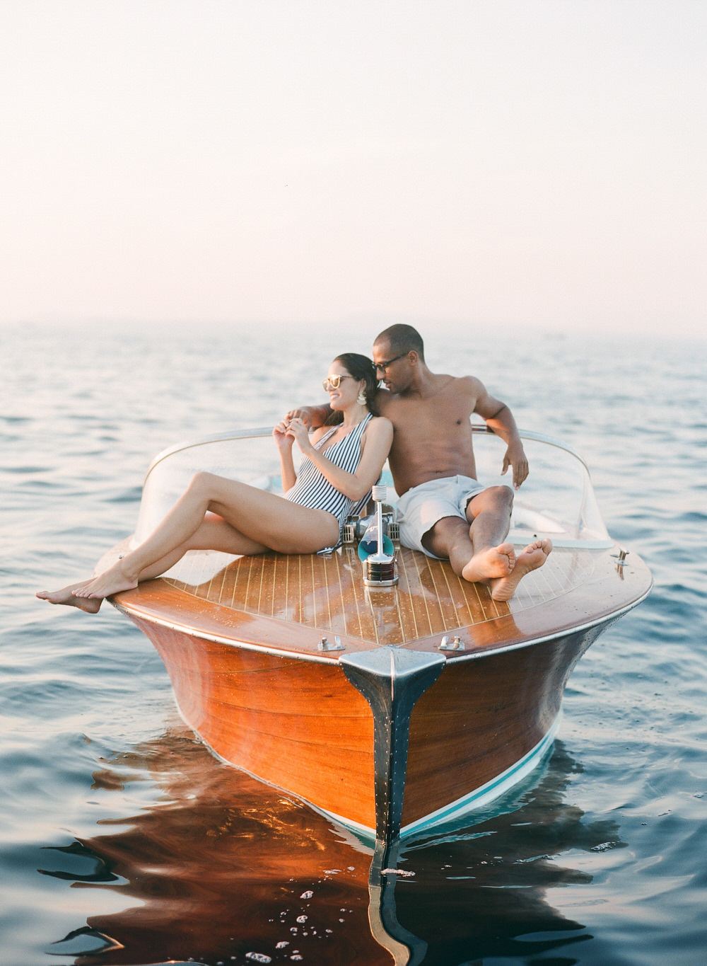 newlyweds lounging on boat in the Amalfi Coast
