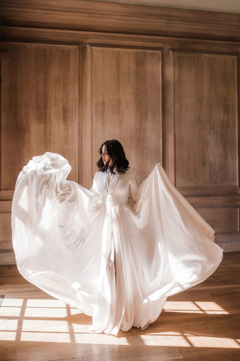 Nortier wedding dress with movement, buttons and billowing sleeves.