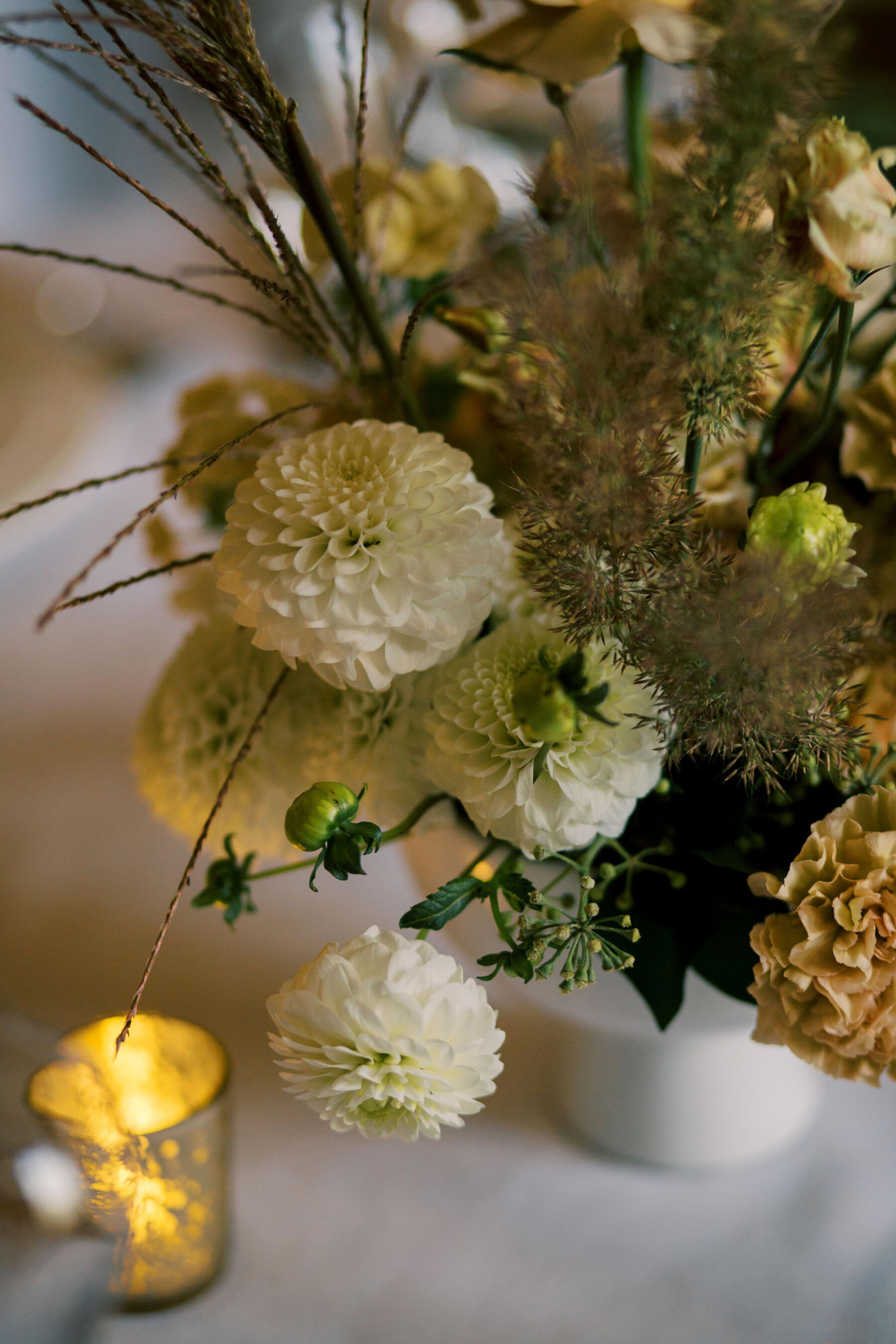Gothic Architecture Inspired Wedding Styling, at Strawberry Hill House 9 Yellow, neutral and toffee tone flowers and white Dahlia and grasses, in a low ceramic bowl. Modern contemporary wedding flowers by Johanna Pedrick. Helen Warner Photography.
