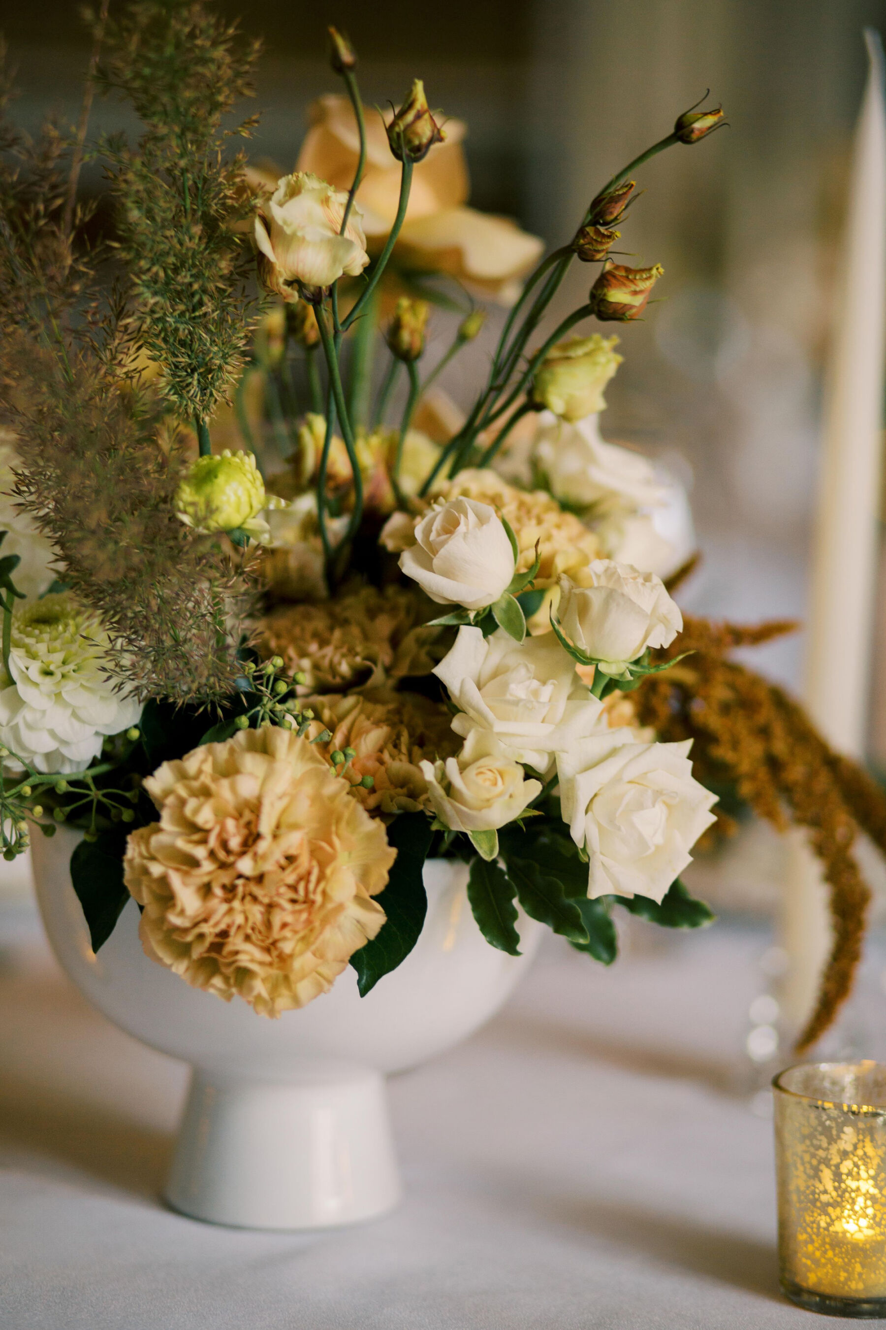 Gothic Architecture Inspired Wedding Styling, at Strawberry Hill House 7 Yellow, neutral and toffee tone flowers in a low ceramic bowl. Modern contemporary wedding flowers by Johanna Pedrick. Helen Warner Photography.