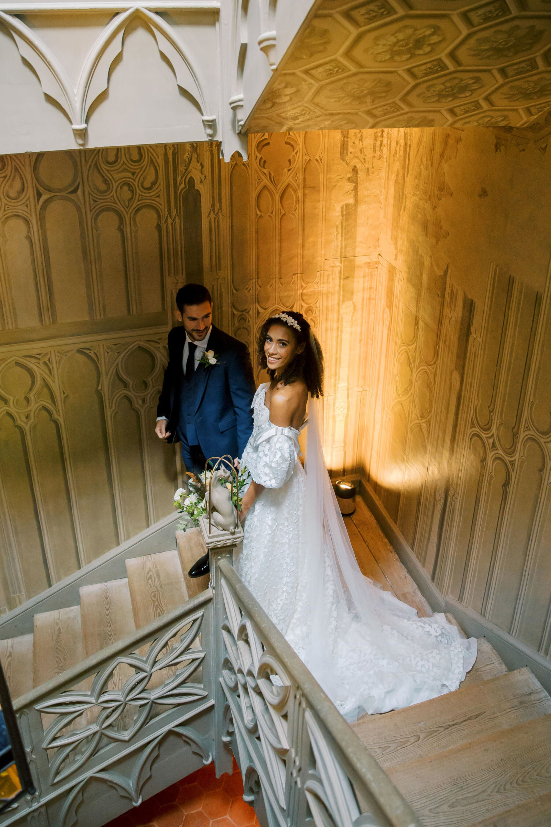 Gothic Architecture Inspired Wedding Styling, at Strawberry Hill House 19 Modern bride and groom descend the carved wooden staircase at Strawberry Hill House. Helen Warner Photography.