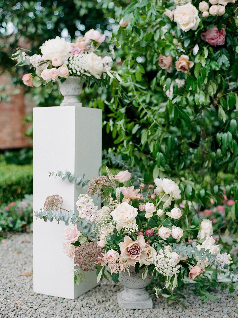 garden wedding ceremony with oversized floral arrangements and peonies