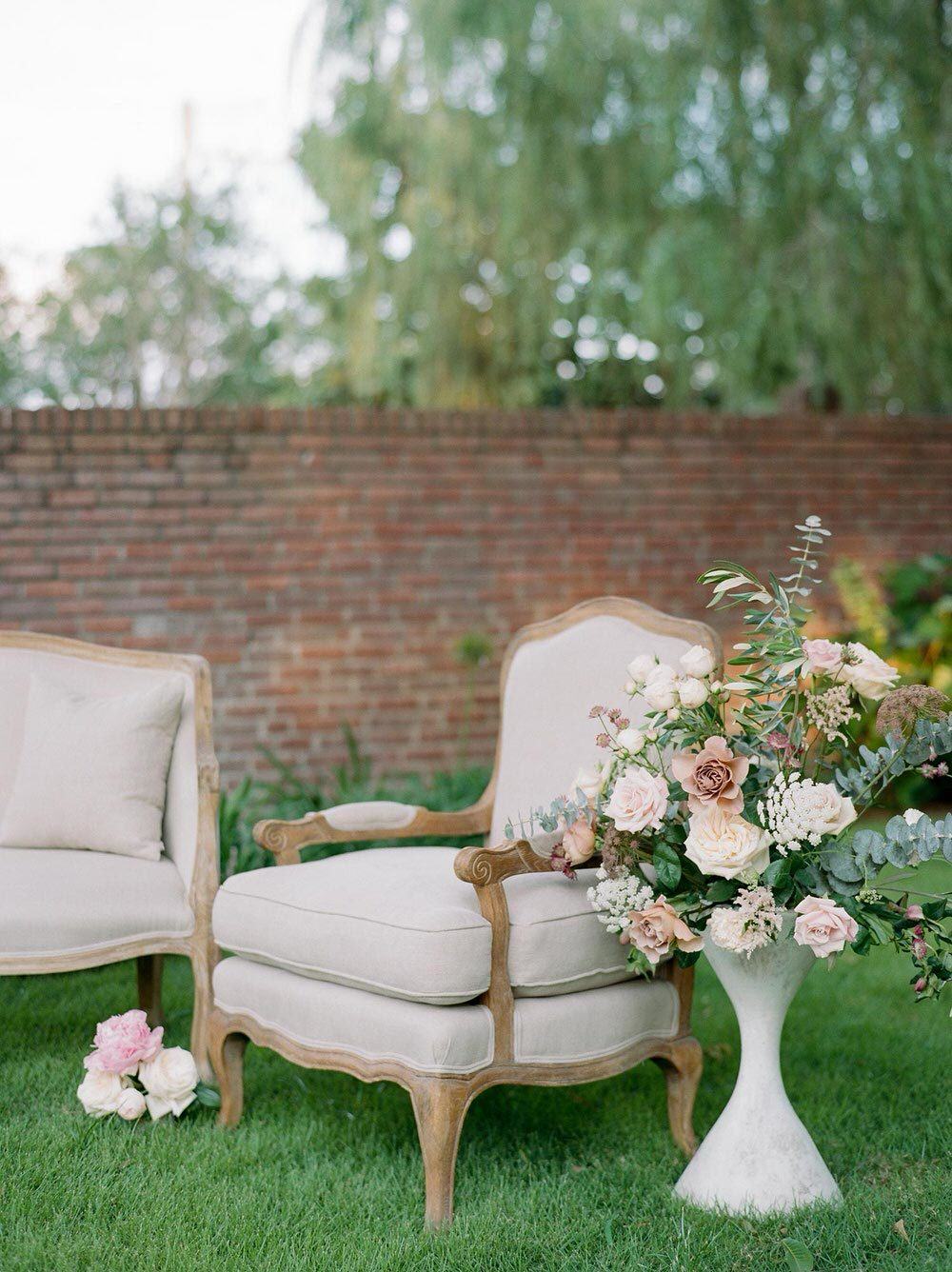 garden wedding lounge with vintage armchair