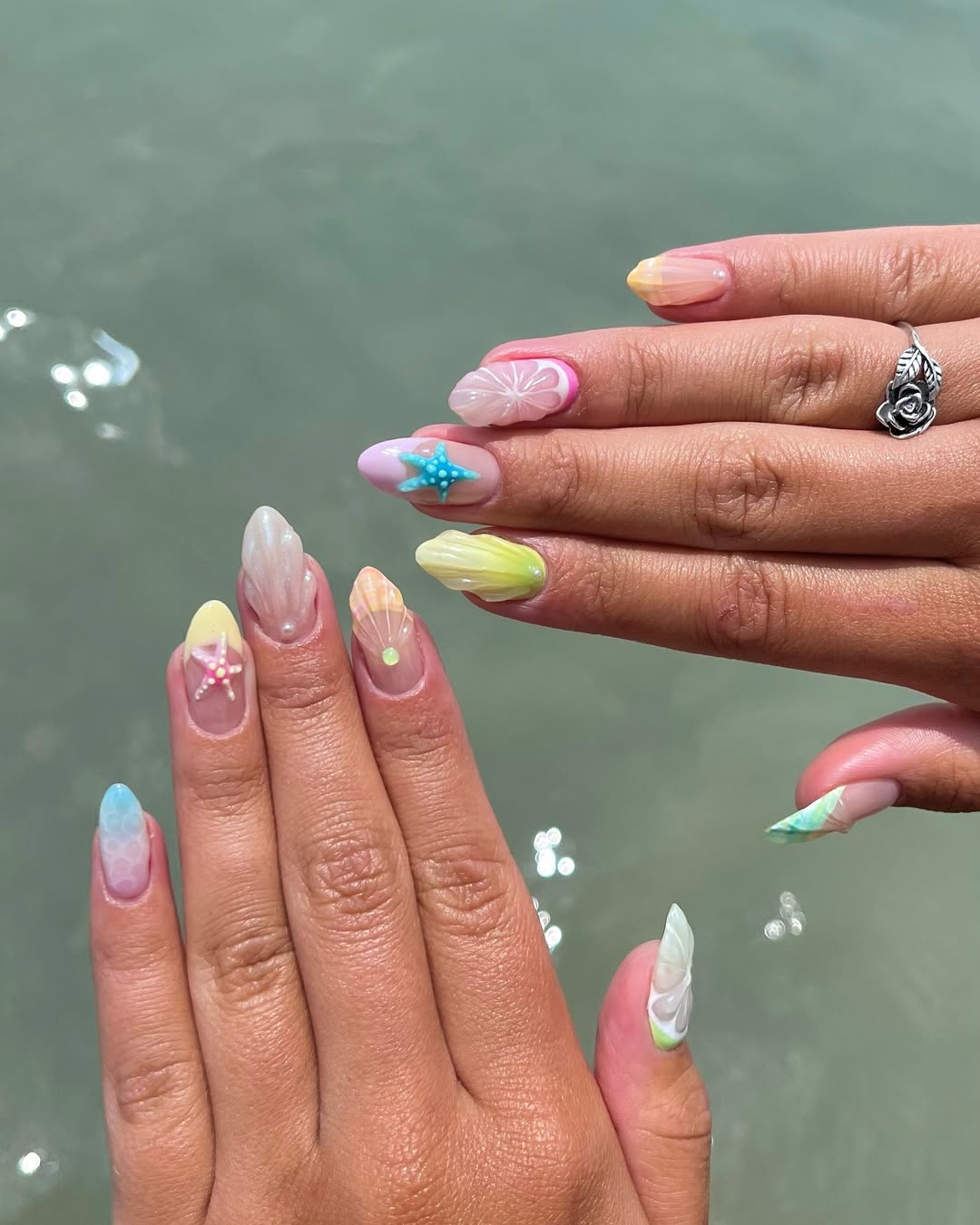 cute mermaid nails inspo for a 2025 tropical beach vacation with trendy 3D nail art in bright colors