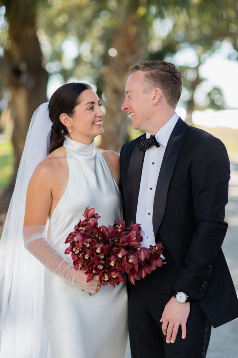 Bold Red Orchids and Black Tie Elegance at This Lowndes Grove Wedding